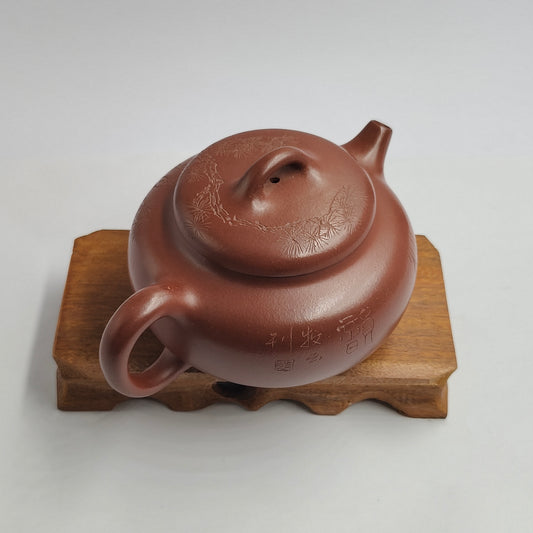 Master Yin Jiaji hand-made carved pine teapot in red skin dragon persimmon garden.
