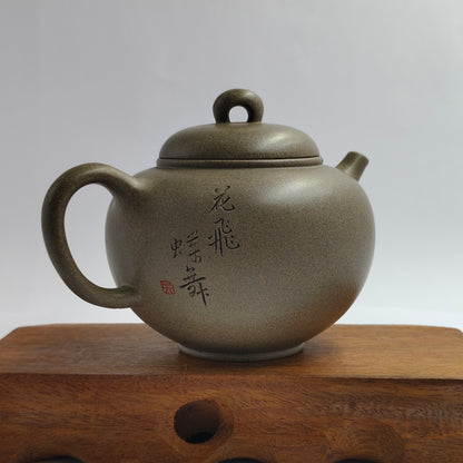 Master Yin Jiaji hand-made Qing Duan Lingyun carved teapot.