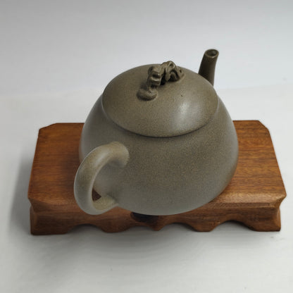 Master Yin Jiaji handcrafted the Qing Clay Taihu stone teapot