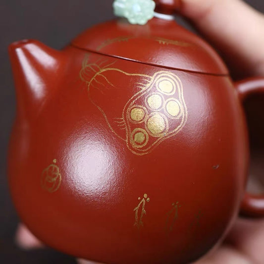 Yixing zishahu raw ore Zou Pi Zhu Mud is hand painted with golden lotus and dragon eggs