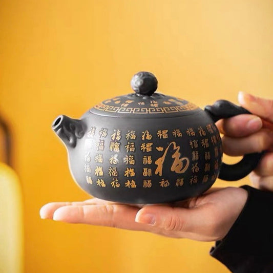 Yixing Zisha Pot is hand-carved and painted with Baifu color-changing and Fengming Xishi Pot