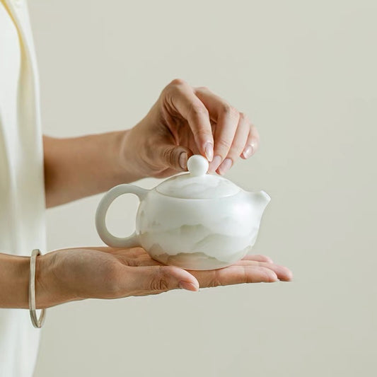 White porcelain teapot with vegetarian suet jade and Xi Shi pot