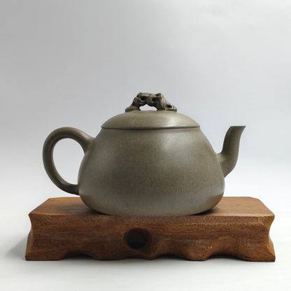 Master Yin Jiaji handcrafted the Qing Clay Taihu stone teapot