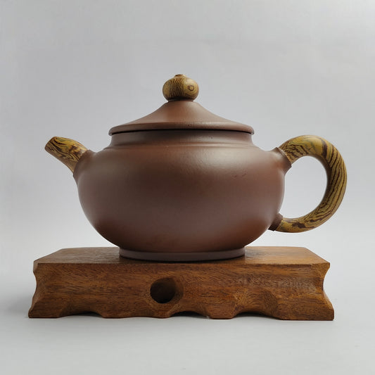 Master Yin Jiaji handmade purple mud hat teapot.