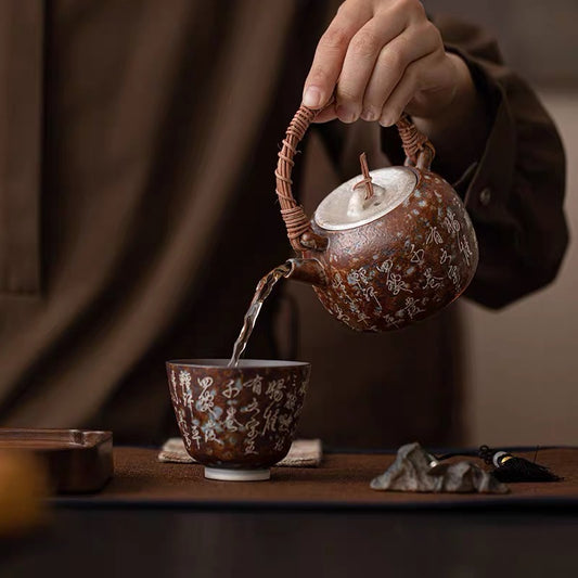 Seven bowls of tea poems, silver vines and old pottery clay vintage teapot.