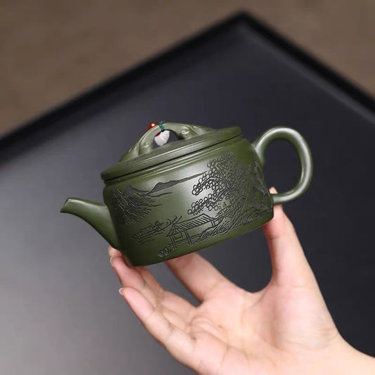 Yixing purple clay pot is hand-carved with green clay and painted with Chinese tile pot