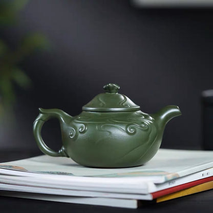 Yixing purple clay teapot pure handmade green mud fish design