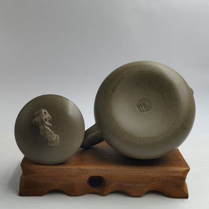 Master Yin Jiaji handcrafted the Qing Clay Taihu stone teapot