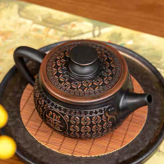 Purple pottery teapot can be lifted and Fengming can be rotated. Handmade Hanwa teapot